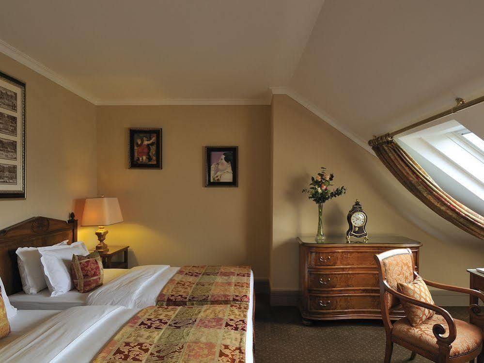 فندق دو لا سيغون جنيفا المظهر الخارجي الصورة A room at the hotel